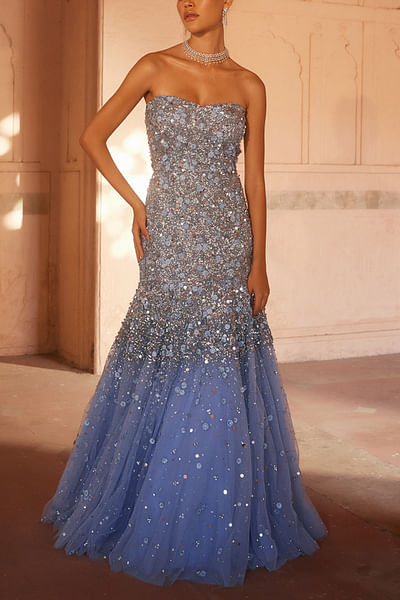 Blue sequinned strapless gown