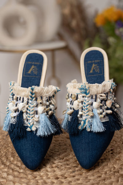 Blue tassel and shell embellished mules