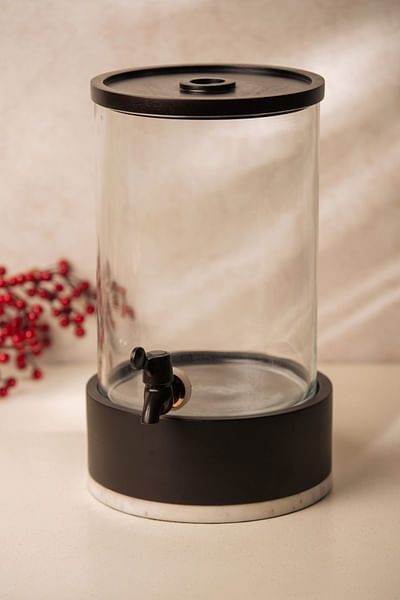 Brown glass and wooden drink dispenser