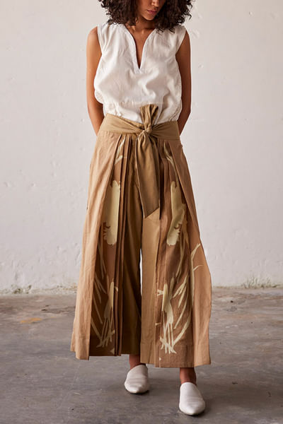 Camel brown floral print trousers