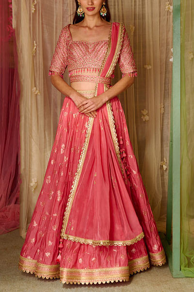 Coral pink tiered brocade lehenga set