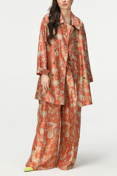 Coral rainforest print trench coat