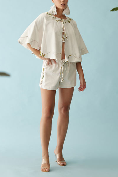 Cream floral embroidery and printed reversible cape