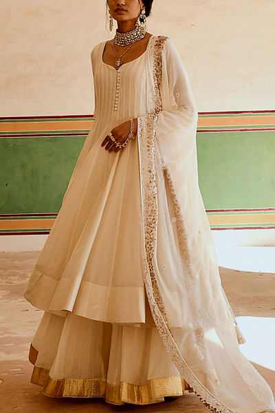 Cream gota patti embellished pleated anarkali and skirt set