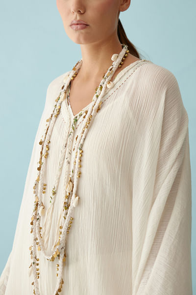 Cream shell and ghungroo braided long necklace