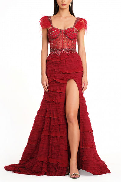 Deep red frill and feather detailed gown