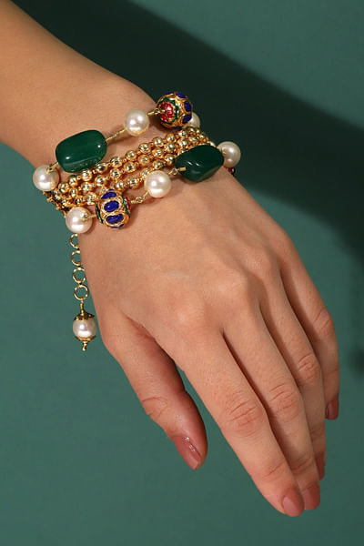 Emerald green stone and chained bracelet
