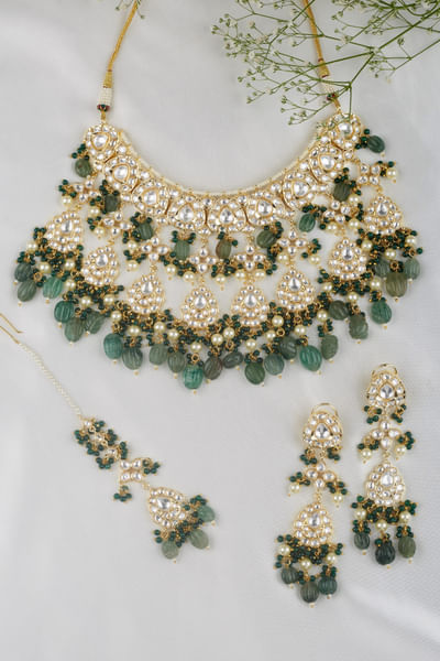 Emerald stone studded kundan choker set
