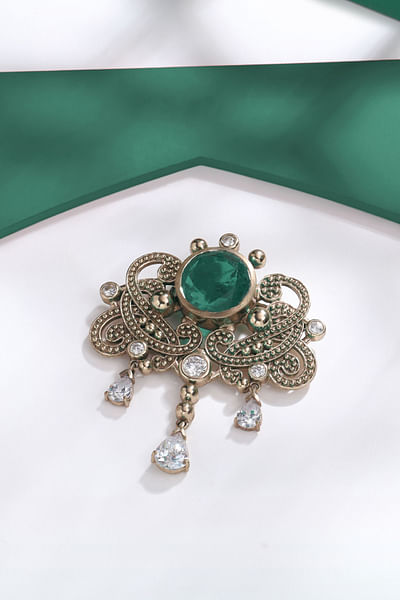 Gold and green gemstone tasselled brooch
