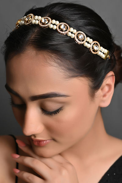 Gold and off-white kundan and pearl head gear