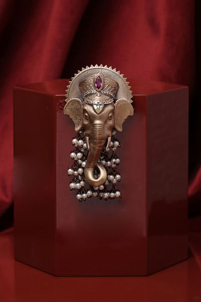 Gold and white Ganesha glass stone brooch