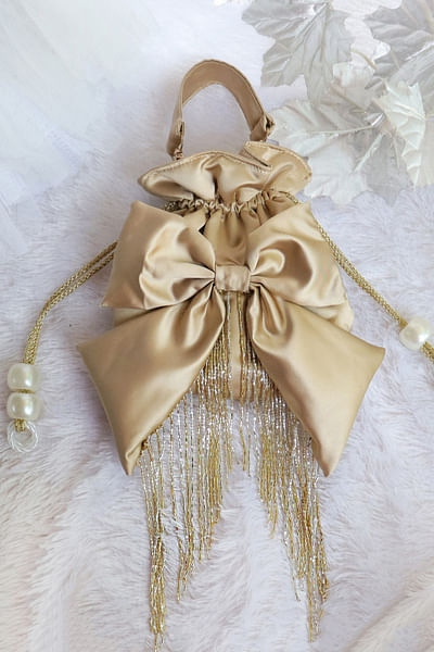 Gold bow detailed kids potli bag