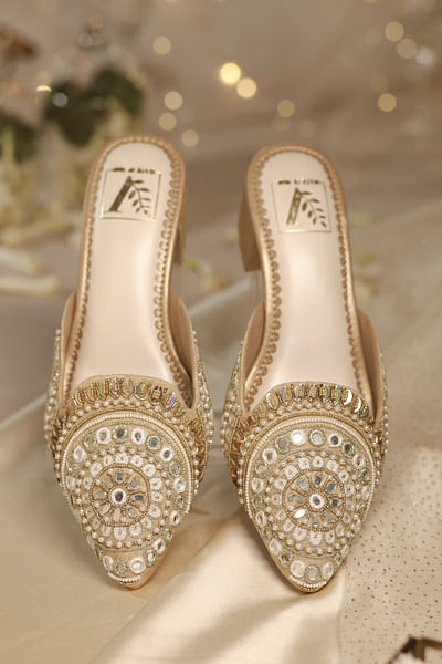 Gold circular embellished mule heels