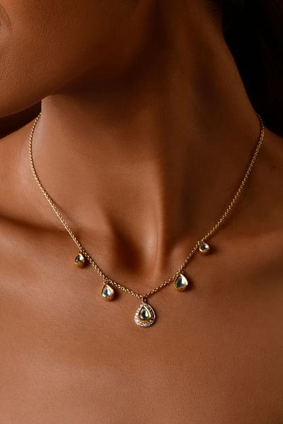 Gold diamond embellished necklace