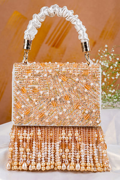 Gold embellished clutch bag
