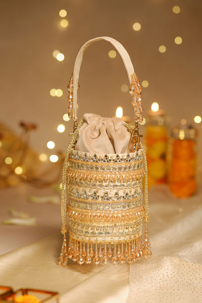 Gold embroidered bucket bag