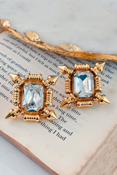 Gold fleur stone stud earrings