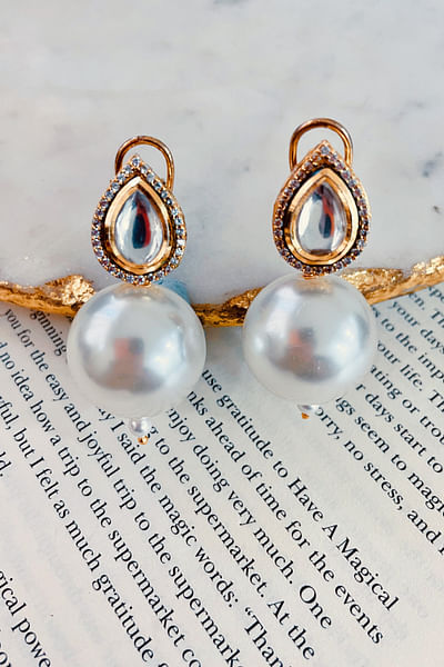 Gold kundan and pearl drop earrings