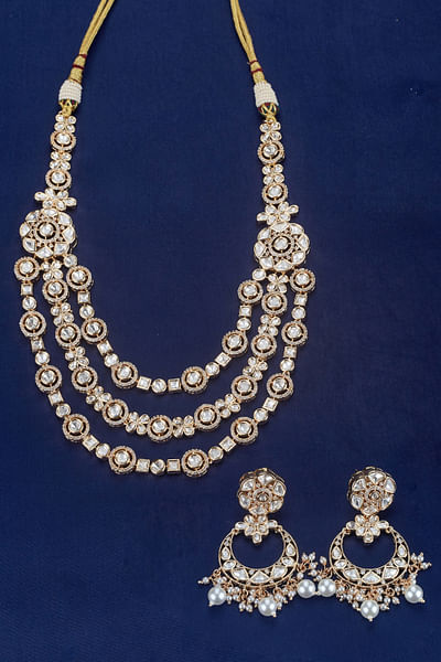 Gold kundan embellished layered necklace set