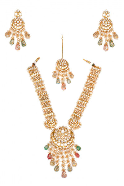 Gold kundan necklace and maang tikka set