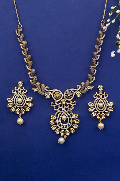 Gold meenakari and polki embellished necklace set