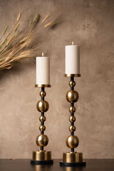 Gold metal tall baller candle holder set