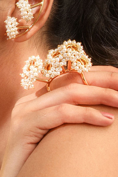 Gold pearl embellished ring