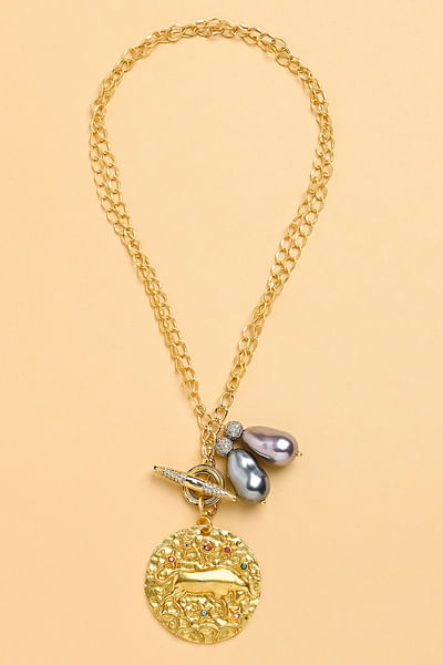 Gold pearl Taurus zodiac necklace