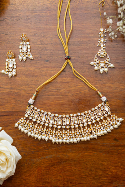 Gold polki kundan and pearl necklace set