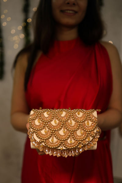 Gold scallop embroidery clutch