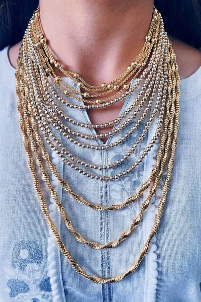 Gold textured bead and chain layered necklace