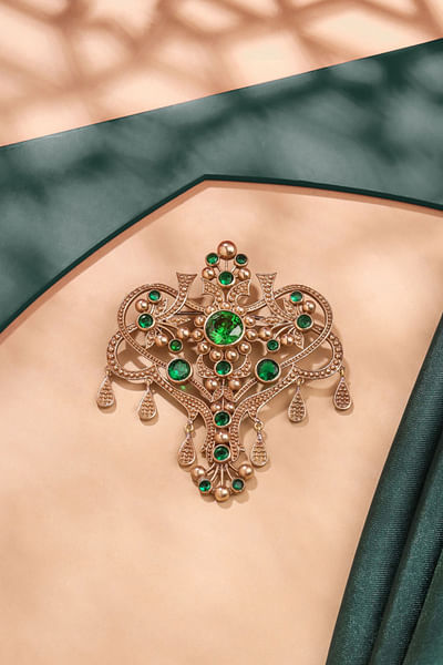 Green and gold glass stone studded brooch