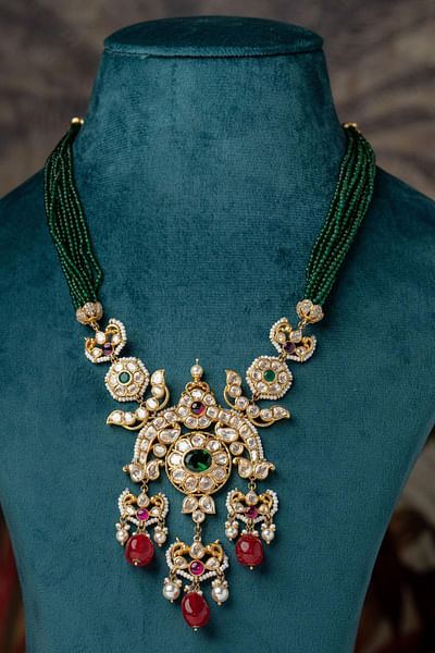 Green and red gemstone necklace