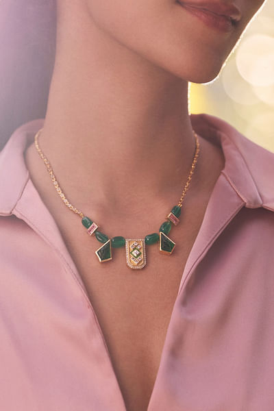 Green cubic zirconia and carved stone necklace