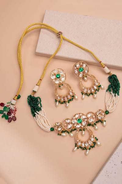 Green emerald stone and kundan choker set