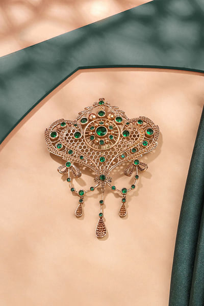 Green glass stone studded brooch