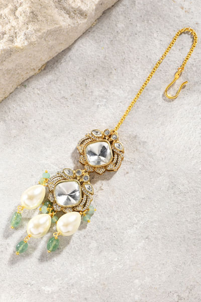 Green kundan polki and pearl maang tikka