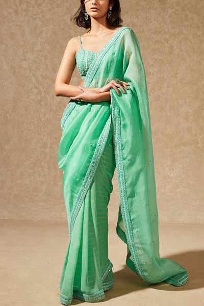 Green linear sequin embellished half and half sari set