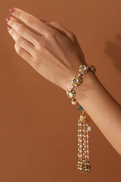 Green pearl and polki bead tassel bracelet
