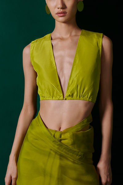 Green plunging neck blouse