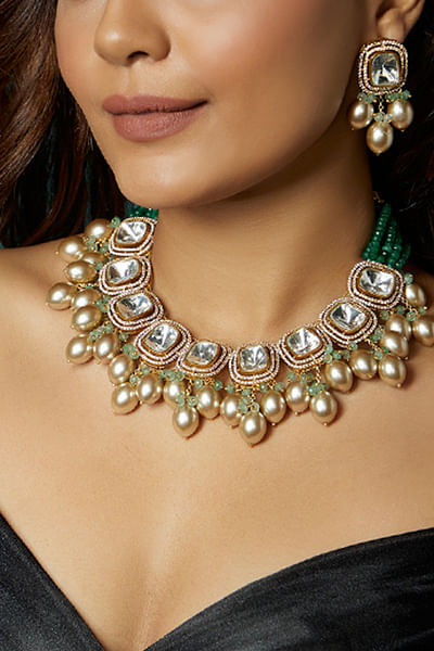 Green polki and kundan embellished necklace set