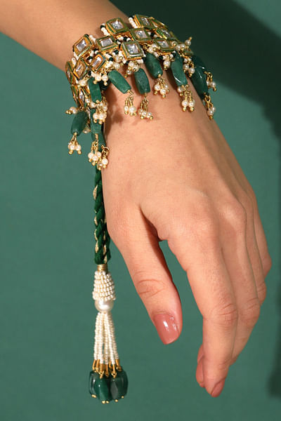 Green stone and polki tassel bracelet