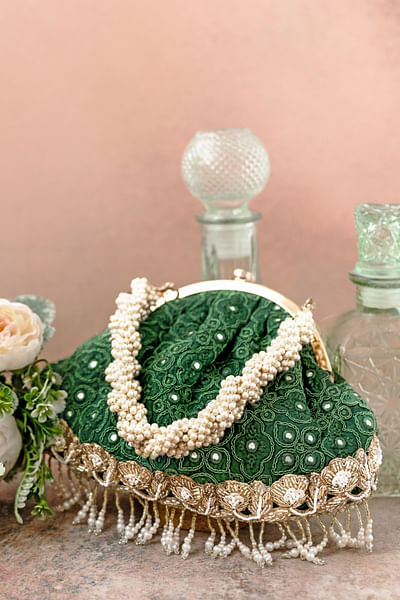 Green thread and mirror embroidery purse