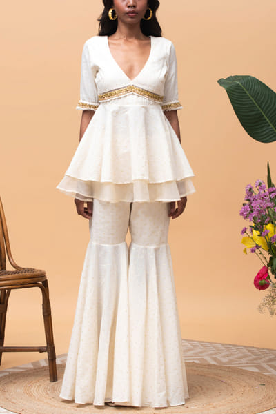 Ivory embellished peplum top and gharara