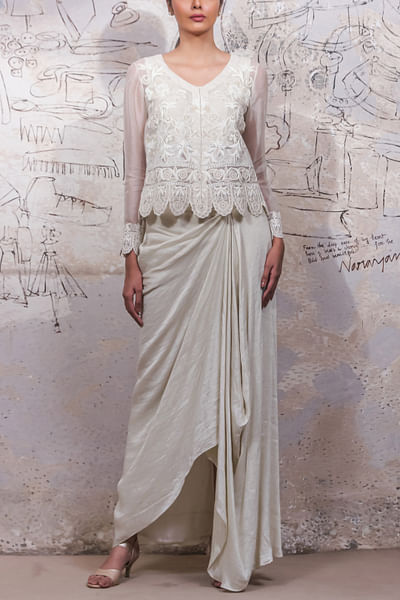 Ivory embroidered jacket and draped skirt