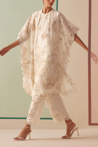 Ivory floral appliqued tulip pants