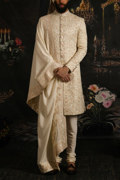 Ivory intricate work sherwani set