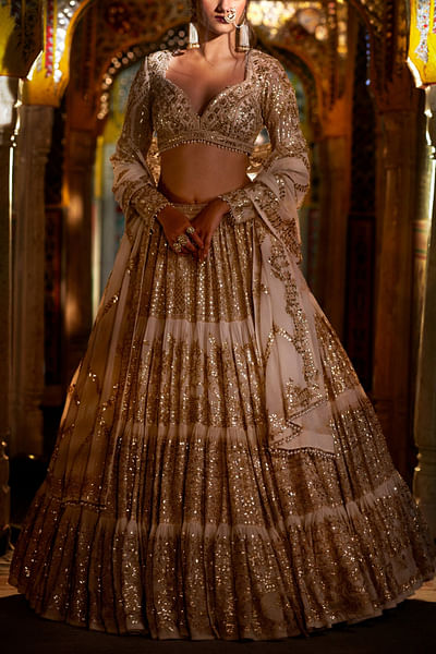 Ivory multi-tiered embellished lehenga set