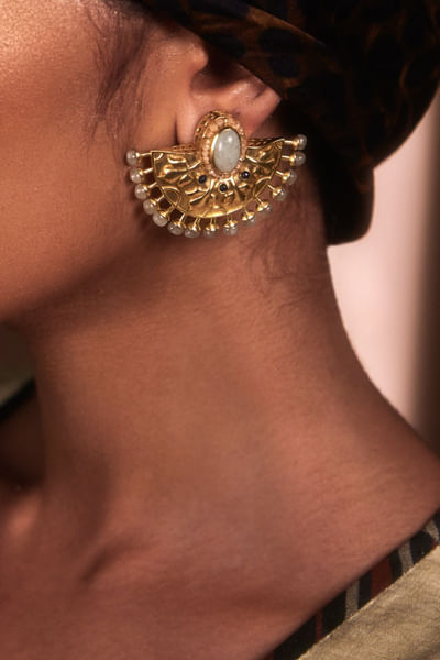 Ivory stone and carved earrings