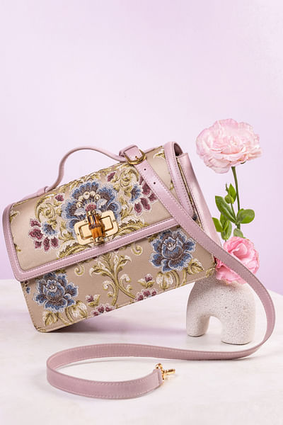 Lilac and neutral floral woven sling bag